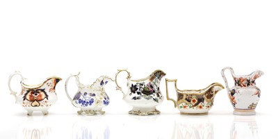 Lot 213 - A collection of ten cream jugs