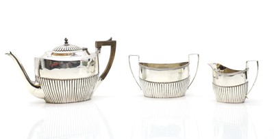 Lot 15 - A three piece silver tea service