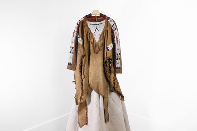Lot 354 - A Native American man's beaded hide war shirt