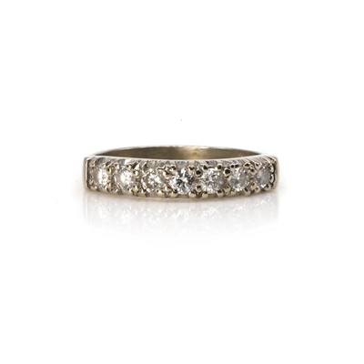 Lot 109 - An 18ct white gold diamond seven stone ring