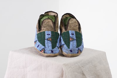 Lot 301 - A pair of Native American beaded hide moccasins