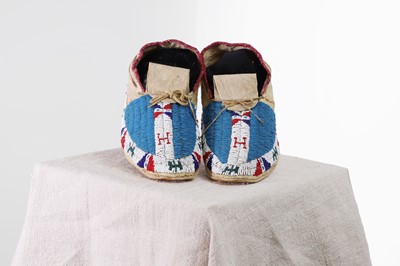 Lot 329 - A pair of Native American beaded hide moccasins