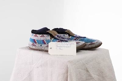 Lot 333 - A pair of Native American beaded hide moccasins