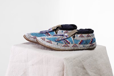 Lot 333 - A pair of Native American beaded hide moccasins