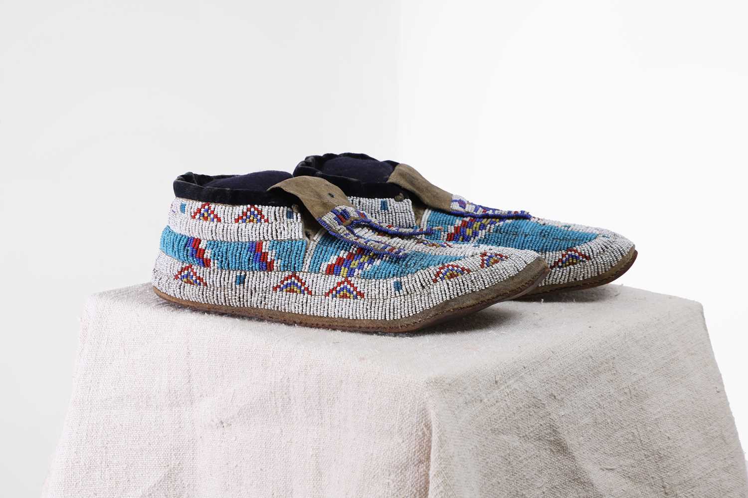 Lot 333 - A pair of Native American beaded hide moccasins