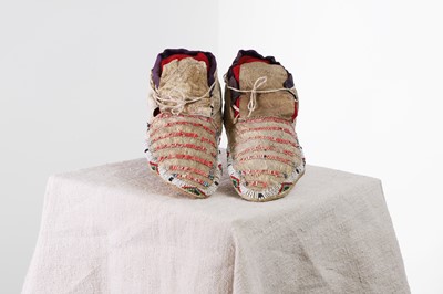 Lot 317 - A pair of Native American beaded and quilled hide moccasins