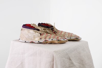 Lot 317 - A pair of Native American beaded and quilled hide moccasins