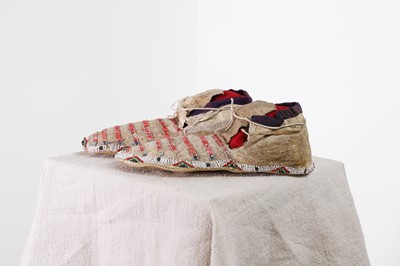 Lot 317 - A pair of Native American beaded and quilled hide moccasins