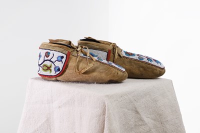 Lot 360 - A pair of Native American beaded hide moccasins
