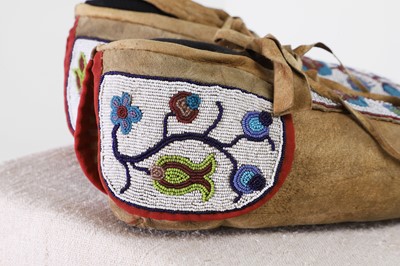 Lot 360 - A pair of Native American beaded hide moccasins