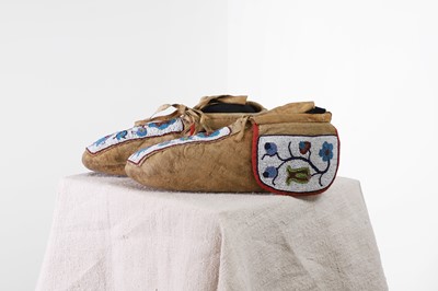 Lot 360 - A pair of Native American beaded hide moccasins