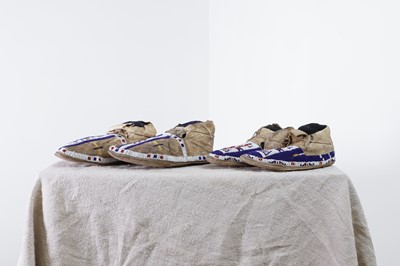 Lot 322 - Two pairs of Native American beaded hide moccasins