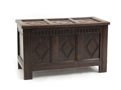 Lot 661 - An oak coffer