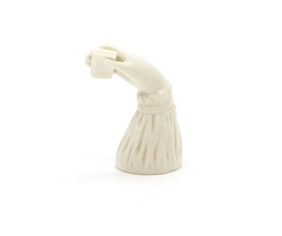 Lot 138 - A porcelain candle snuffer