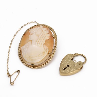 Lot 278 - A 9ct gold shell cameo brooch and a heart shaped padlock