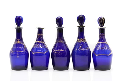 Lot 222 - Two pairs of Regency glass decanters and stoppers