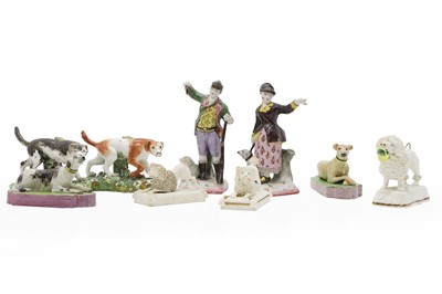 Lot 110A - A collection of Staffordshire pottery figures