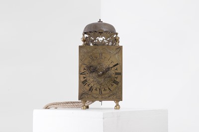Lot 220 - A brass lantern clock