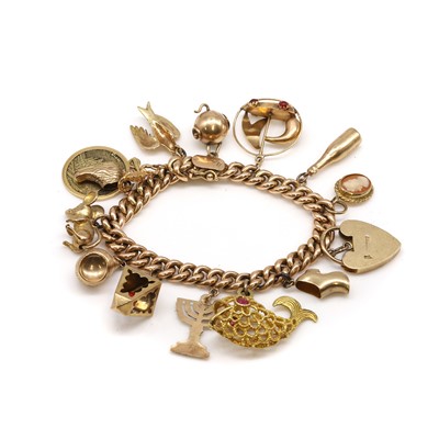 Lot 443 - A 9ct gold charm bracelet