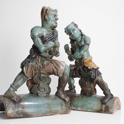 Lot 27 - A pair of Chinese turquoise-glazed earthenware ridge tiles