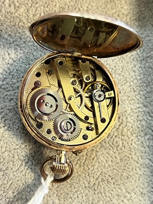Lot 34 - A 9ct gold ladies top wind open faced fob watch