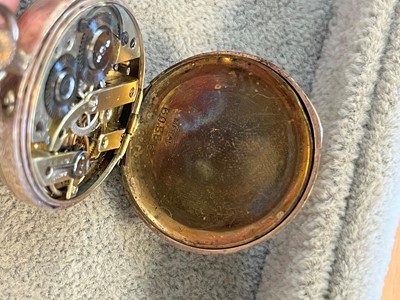 Lot 34 - A 9ct gold ladies top wind open faced fob watch
