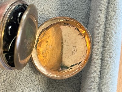 Lot 34 - A 9ct gold ladies top wind open faced fob watch