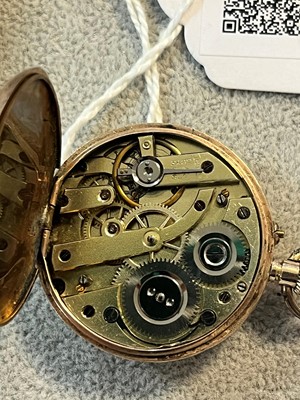 Lot 34 - A 9ct gold ladies top wind open faced fob watch