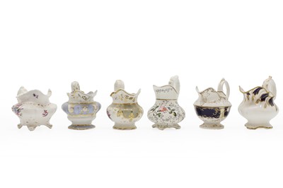Lot 197 - A collection of porcelain cream jugs