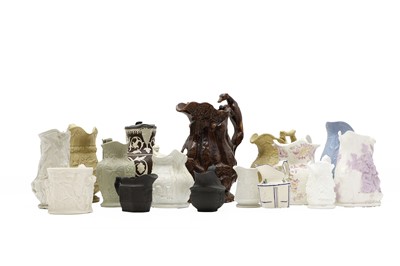 Lot 203 - A group of moulded pottery jugs