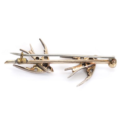 Lot 15 - A Victorian rose cut diamond swallow brooch