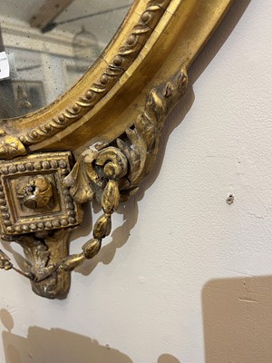 Lot 1 - A pair of carved giltwood and gesso girandole mirrors
