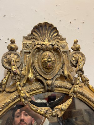 Lot 1 - A pair of carved giltwood and gesso girandole mirrors
