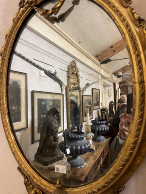 Lot 1 - A pair of carved giltwood and gesso girandole mirrors