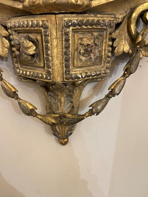 Lot 1 - A pair of carved giltwood and gesso girandole mirrors