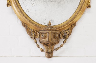 Lot 1 - A pair of carved giltwood and gesso girandole mirrors