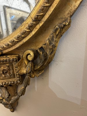 Lot 1 - A pair of carved giltwood and gesso girandole mirrors