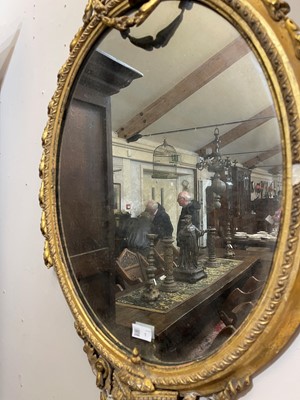 Lot 1 - A pair of carved giltwood and gesso girandole mirrors