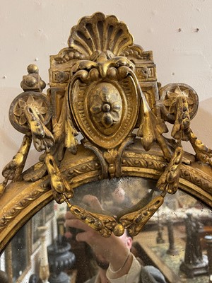 Lot 1 - A pair of carved giltwood and gesso girandole mirrors