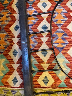 Lot 13 - A Victorian steel club fender