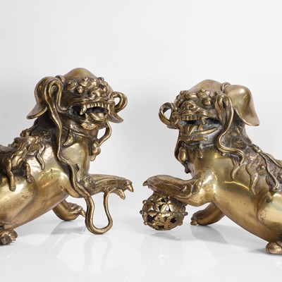 Lot 93 - A pair of Chinese gilt-bronze Buddhist lions
