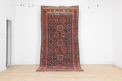 Lot 54 - A Kazak wool rug