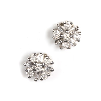 Lot 63 - A pair of white gold diamond cluster stud earrings