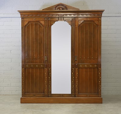 Lot 346 - An Heal & Co. Aesthetic walnut and gilt wardrobe