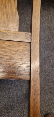 Lot 52 - An Arts and Crafts oak hall chair