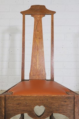 Lot 52 - An Arts and Crafts oak hall chair