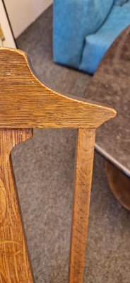 Lot 52 - An Arts and Crafts oak hall chair
