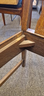 Lot 52 - An Arts and Crafts oak hall chair