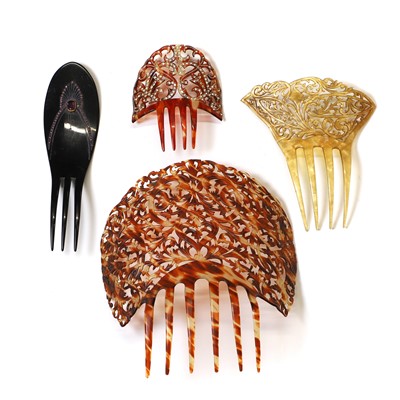 Lot 393 - A group of vintage celluloid peineta hairslides, c.1920