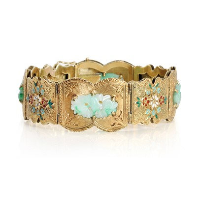 Lot 94 - A carved jade and enamel panel bracelet